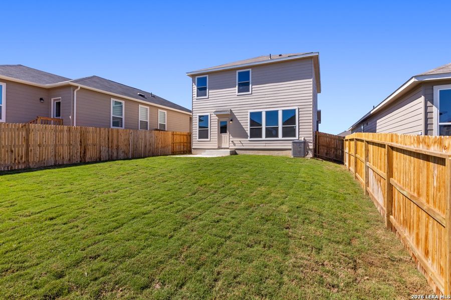 Exterior details and patio area of a home in Knox Ridge, Converse (Image 4).