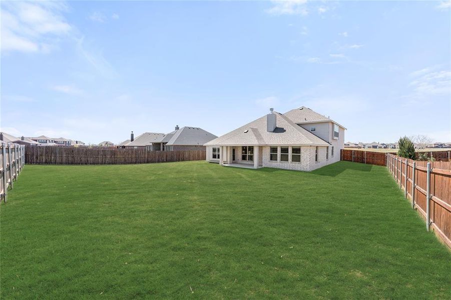 Exterior details and patio area of a home in Sunrise at Garden Valley, Waxahachie (Image 4).
