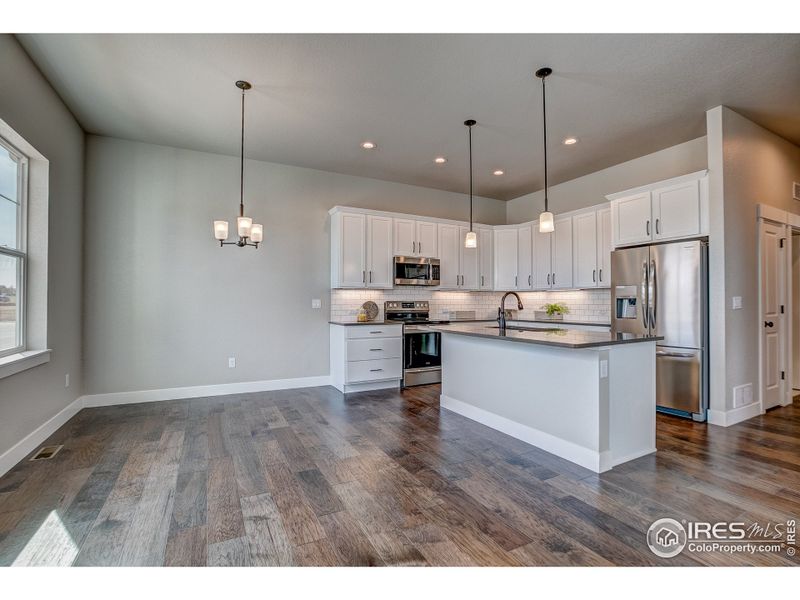 Furnished interior view inside a new home in Highlands at Fox Hill - The Towns, Longmont (Image 2).