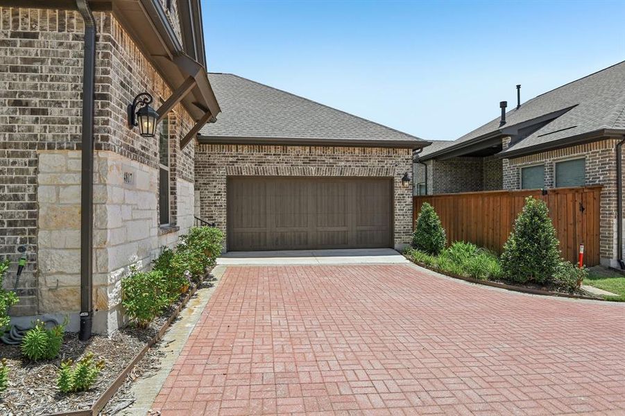 Exterior details and patio area of a home in Elements at Viridian - Garden Series, Arlington (Image 4). Exterior details and patio area of a home in Elements at Viridian - Garden Series, Arlington (Image 4).