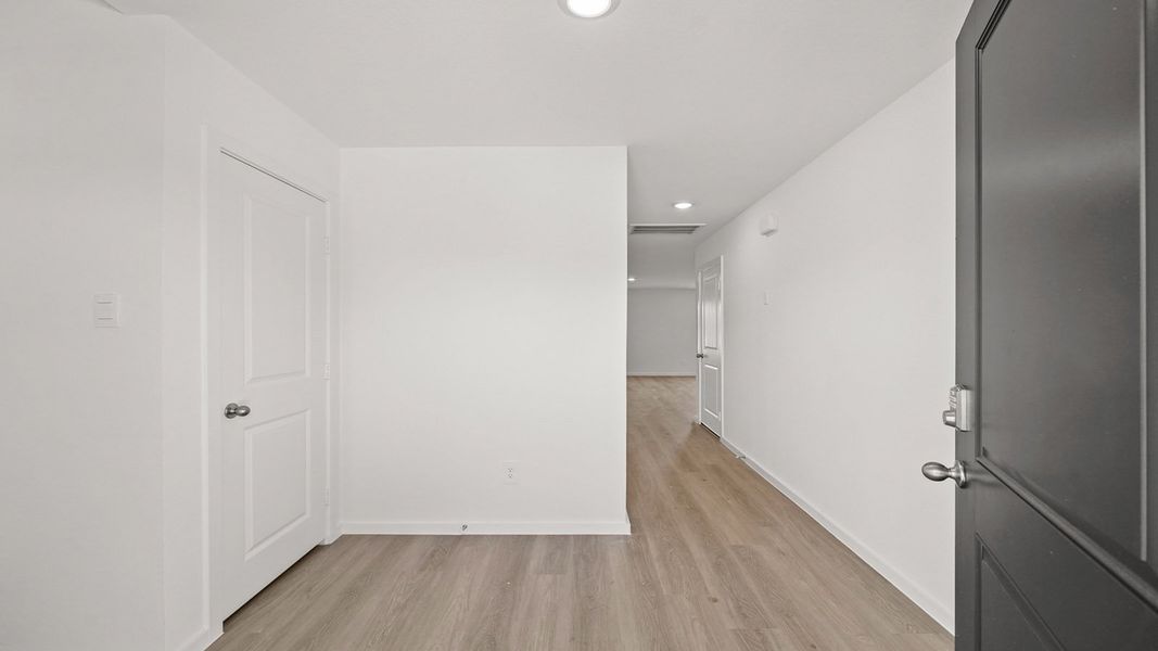 Representative unfurnished interior of a home built from the Callahan by D.R. Horton in Lexington Heights, Willis (Image 10).