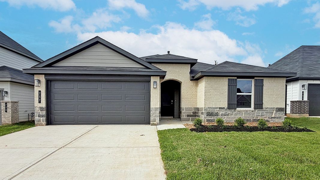 Front exterior of a new home in Silverthorne, Conroe, TX, highlighting curb appeal (Image 1). Front exterior of a new home in Silverthorne, Conroe, TX, highlighting curb appeal (Image 1).