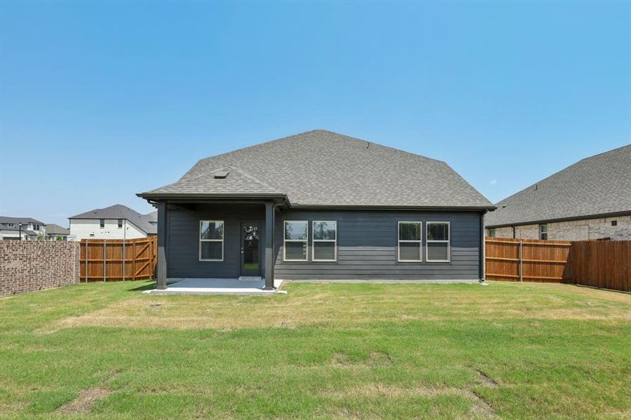 Front exterior of a new home in Windmore, Princeton, TX, highlighting curb appeal (Image 2).