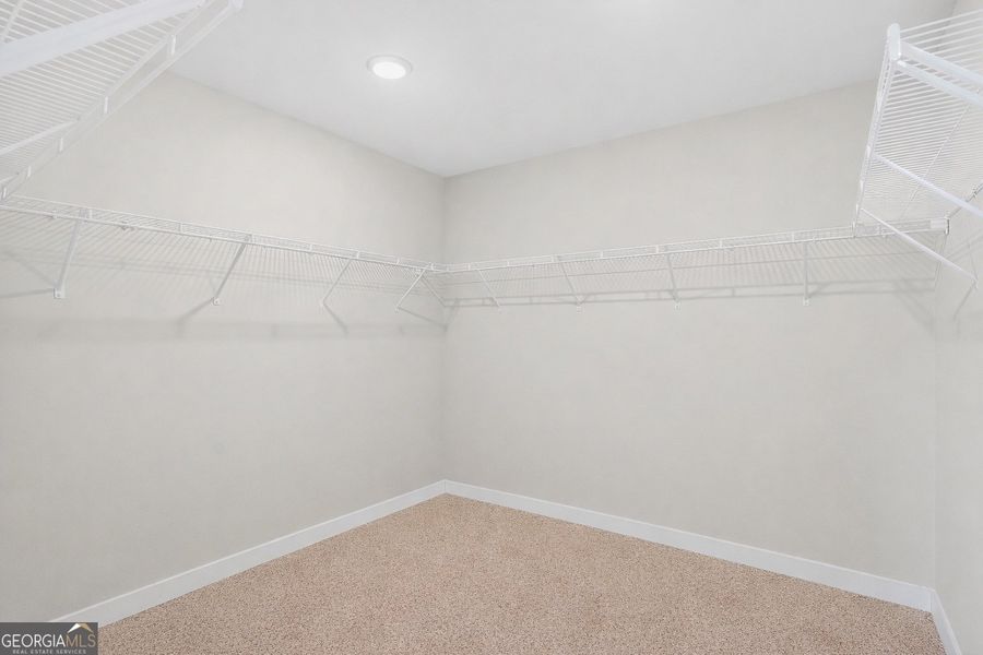 Spacious, unfurnished interior of a new home in The Fairways at Mirror Lake, Villa Rica (Image 41).