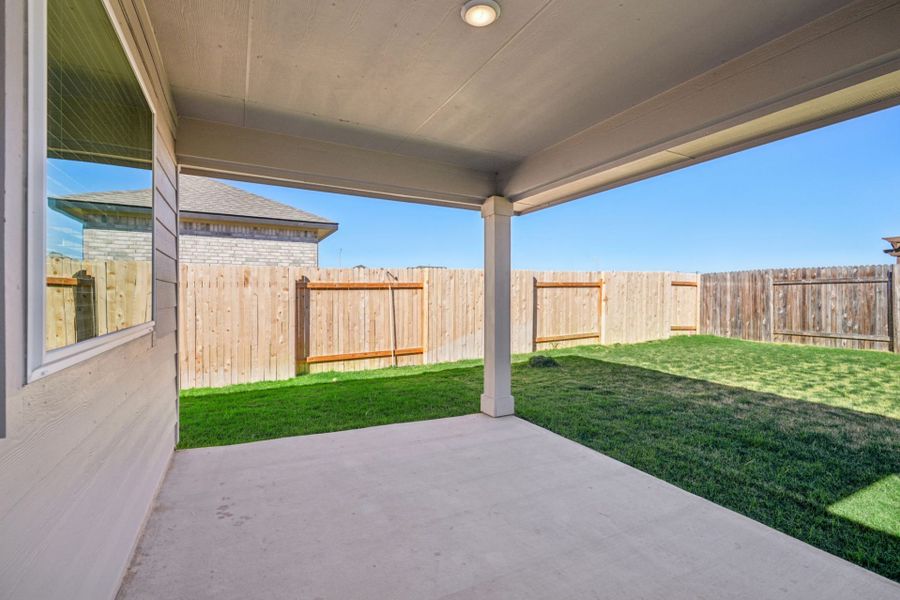 Exterior details and patio area of a home in Village at Three Oaks, Seguin (Image 3).