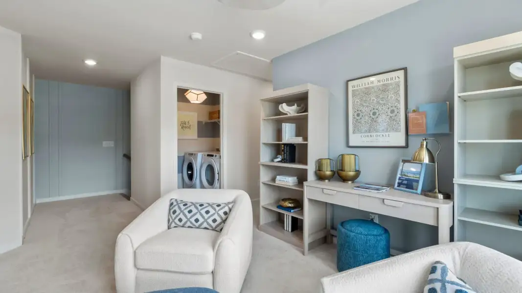 Spacious upstairs loft in new construction townhome for flexible office or lounge use with natural daylight. Spacious upstairs loft in new construction townhome for flexible office or lounge use with natural daylight.
