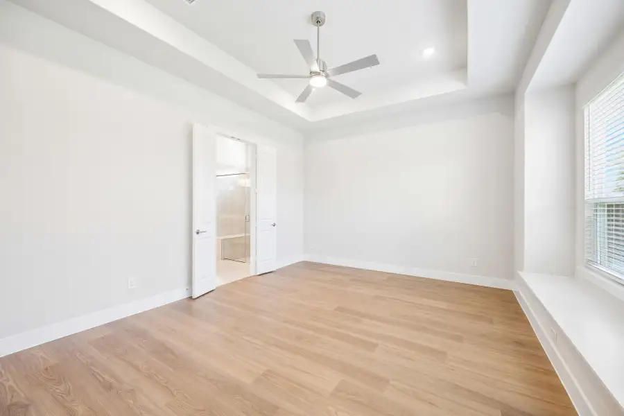 Spacious, unfurnished interior of a new home in Rainwater Crossing, Celina (Image 21).