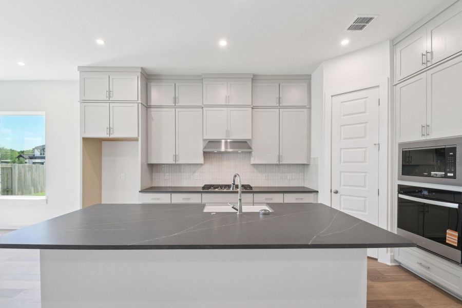 Furnished interior view inside a new home in Persimmon, Buda (Image 13).