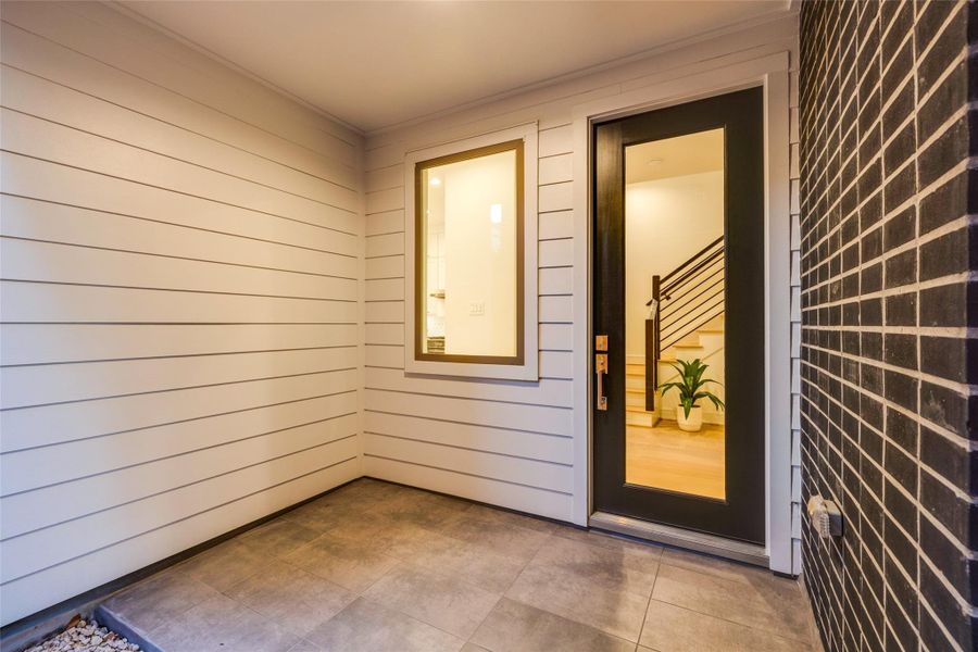 Exterior details and patio area of a home in , Houston (Image 2).