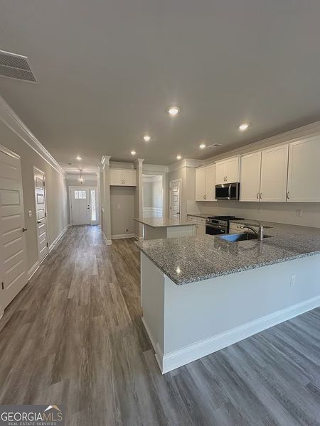 Furnished interior view inside a new home in Mirror Lake at South Harbour, Villa Rica (Image 4).