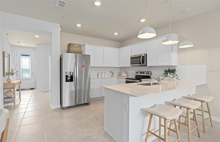 Furnished interior view inside a new home in EverBe, Orlando (Image 6).