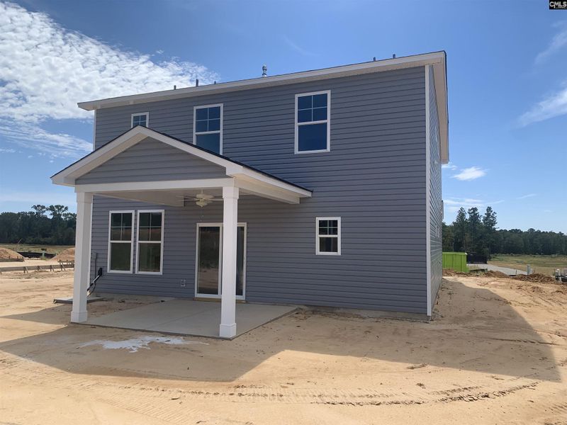 Front exterior of a new home in Peachtree Hills, Lexington, SC, highlighting curb appeal (Image 2).