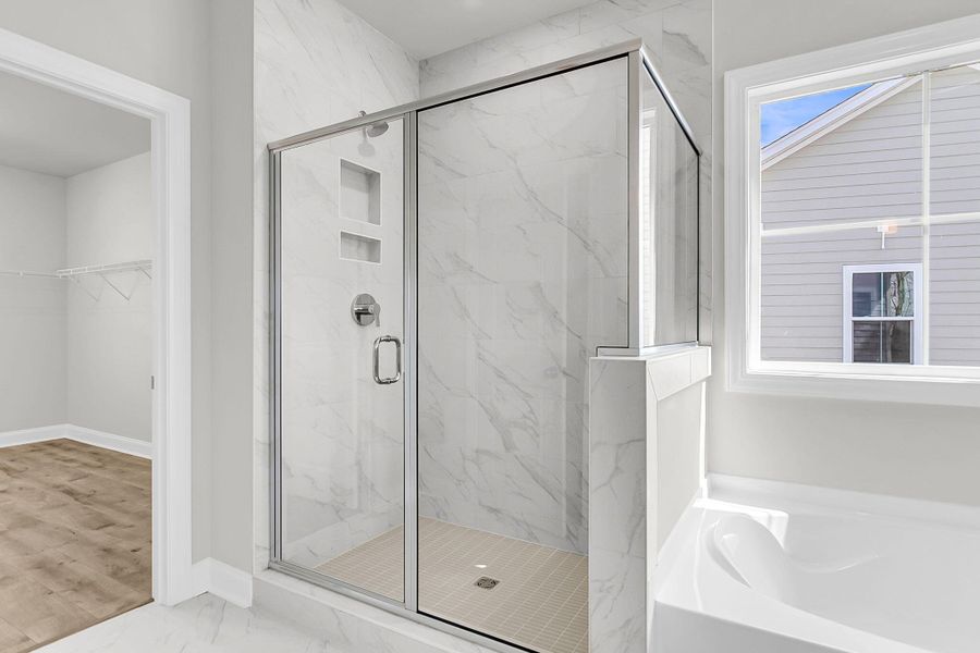 Furnished interior view inside a new home in Tidewater at Lakes of Cane Bay, Summerville (Image 15).