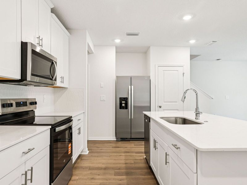 Furnished interior view inside a new home in Bradford Park, Ormond Beach (Image 4).