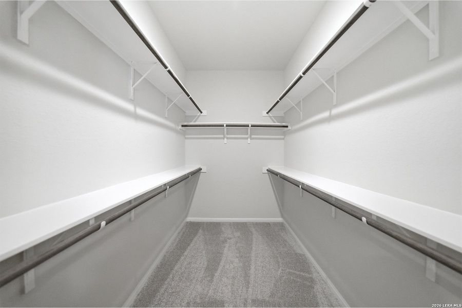 Spacious, unfurnished interior of a new home in The Woodlands at Medina Hills, Mico (Image 19).