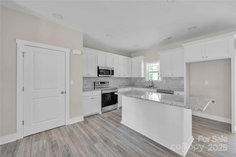 Furnished interior view inside a new home in , Mocksville (Image 10).