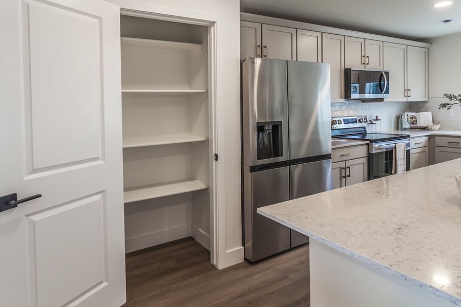 Representative furnished interior of a home built from the Marigold by Hartford Homes in Prairie Song, Windsor (Image 14).