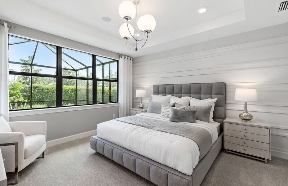 Private owner's suite with elegant tray ceiling