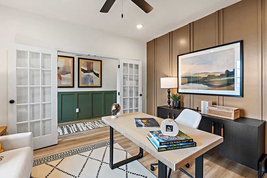 A living room with a large television. A living room with a large television.