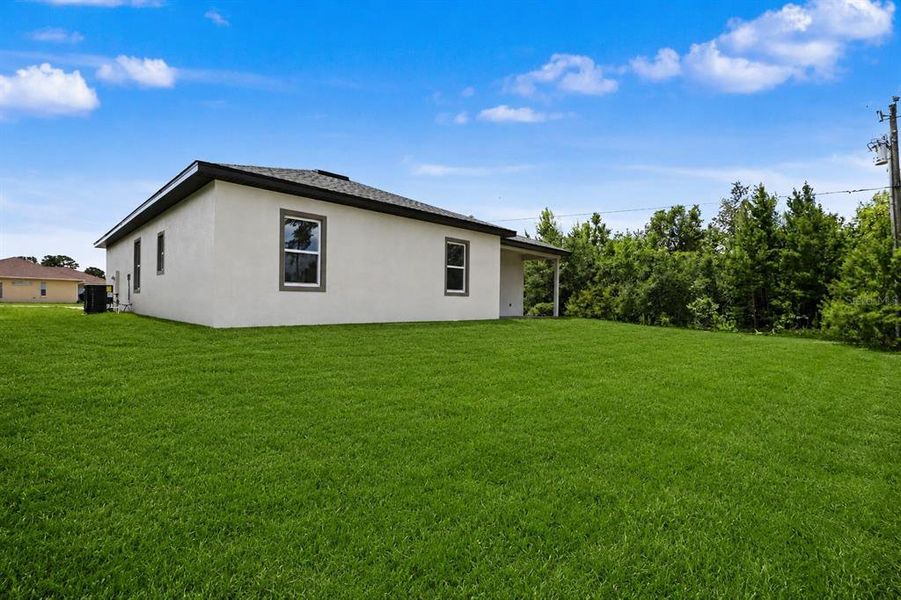Exterior details and patio area of a home in , Ocala (Image 27).