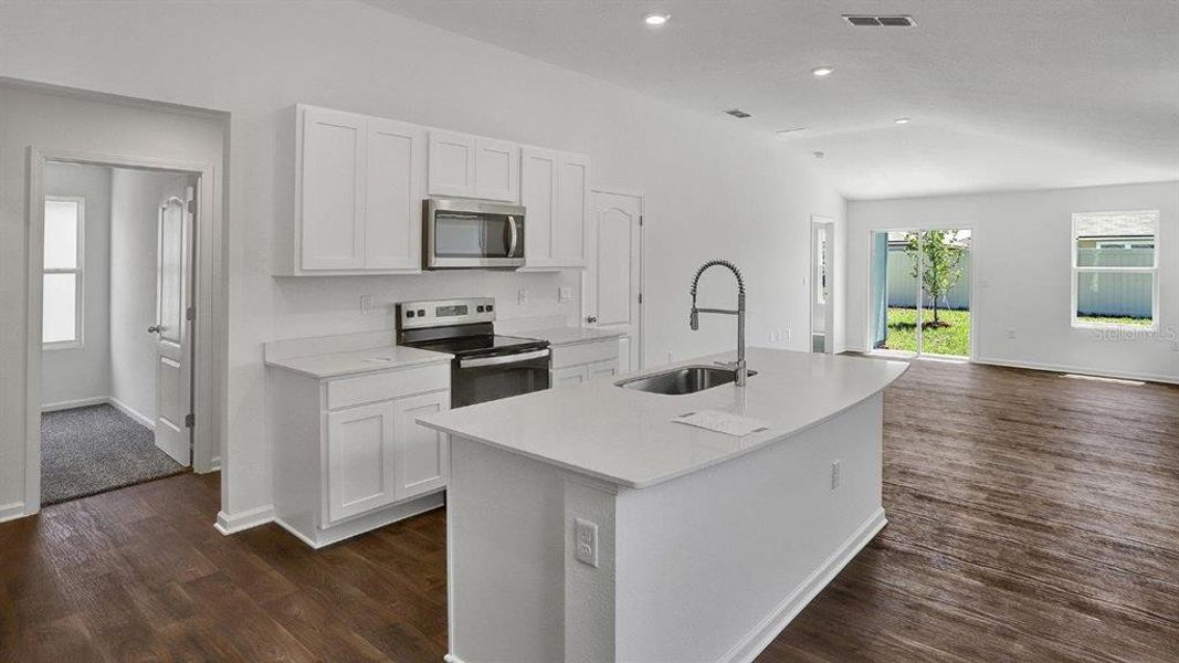 Furnished interior view inside a new home in Grand Reserve, Bunnell (Image 4).