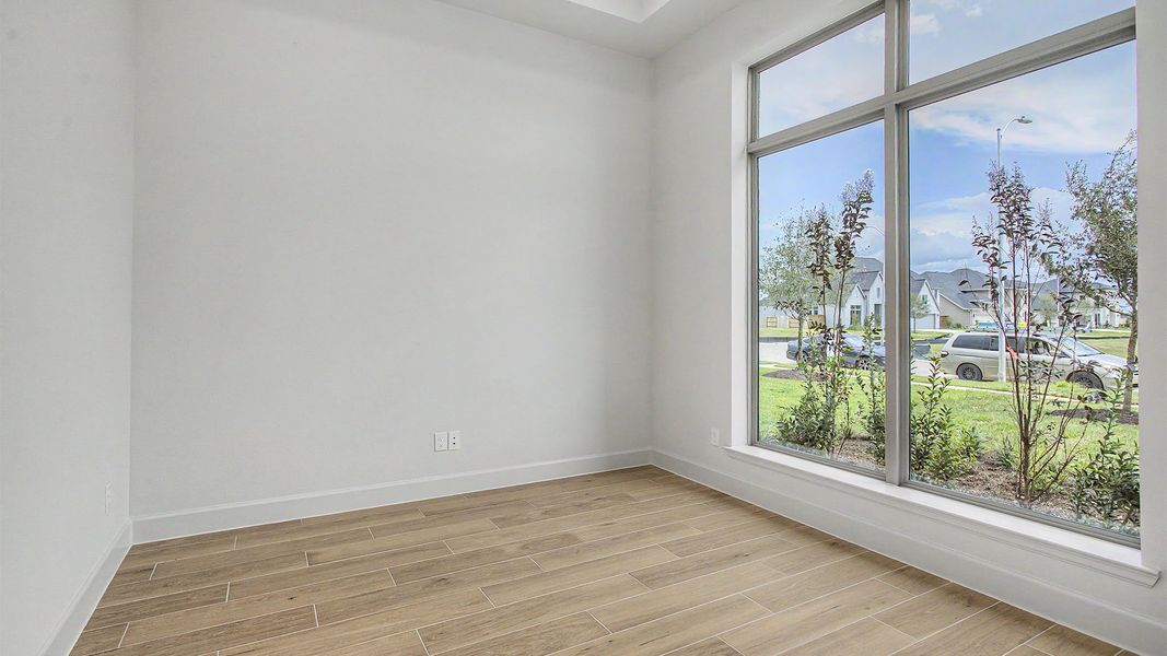 Spacious, unfurnished interior of a new home in Legacy Prairie at Katy Court, Katy (Image 9).