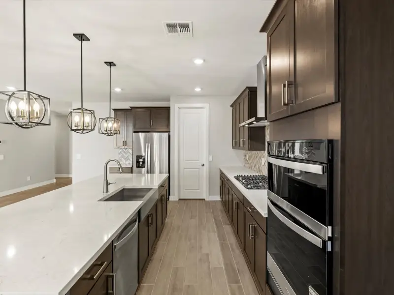 Furnished interior view inside a new home in Entrada Signature Series, Tolleson (Image 3).