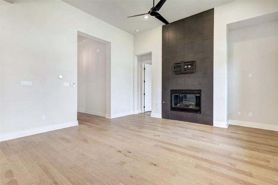 The fireplace is just a switch away from ambience with slate tile all the way up the 12' ceilings.