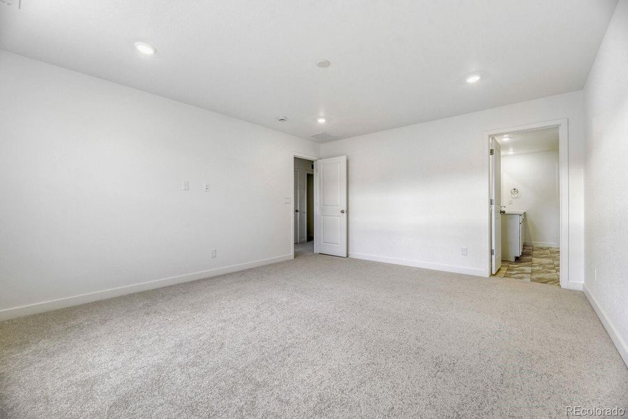Spacious, unfurnished interior of a new home in Newlin Crossing, Parker (Image 19).