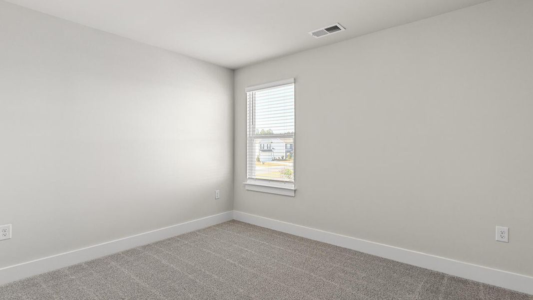 Spacious, unfurnished interior of a new home in Cedar Hill Landing, Navassa (Image 32).