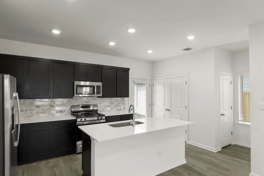 Furnished interior view inside a new home in Trace, San Marcos (Image 9).