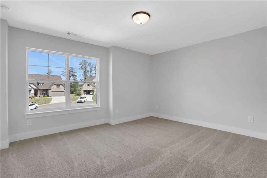 Spacious, unfurnished interior of a new home in Cambridge, Flowery Branch (Image 22).