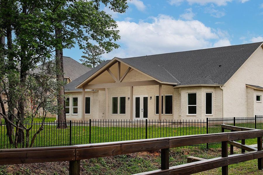 Exterior details and patio area of a home in , Conroe (Image 16).