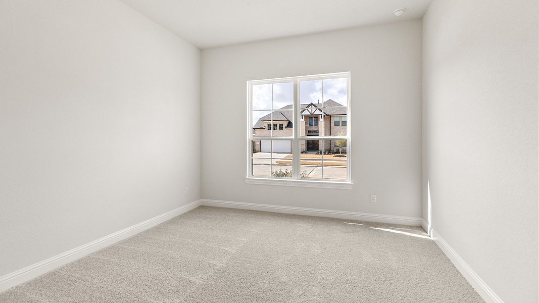 Representative furnished interior of a home built from the Tulane by Brightland Homes in Katy Lakes, Katy (Image 6).