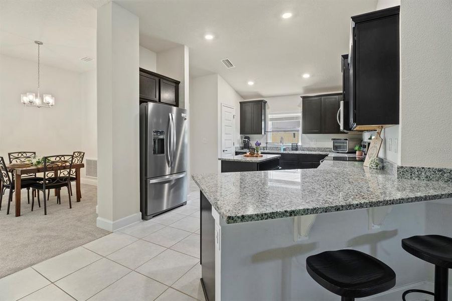 Furnished interior view inside a new home in , Harmony (Image 7).