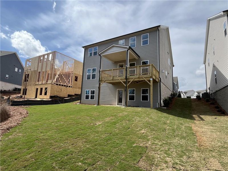 Exterior details and patio area of a home in East Harbor II at Chestatee, Dawsonville (Image 19).