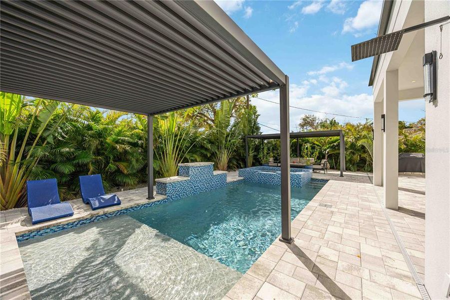 Exterior details and patio area of a home in , Sarasota (Image 25).