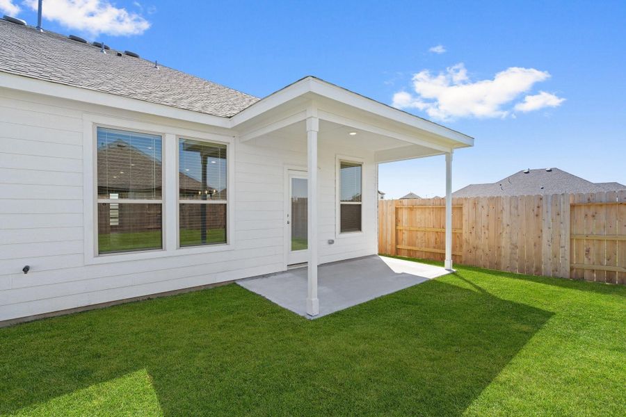 Front exterior of a new home in River Ranch, Dayton, TX, highlighting curb appeal (Image 2). Front exterior of a new home in River Ranch, Dayton, TX, highlighting curb appeal (Image 2).