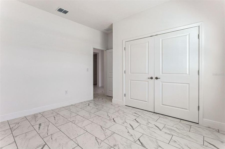 Spacious, unfurnished interior of a new home in Villa Pass, Mascotte (Image 26). Spacious, unfurnished interior of a new home in Villa Pass, Mascotte (Image 26).