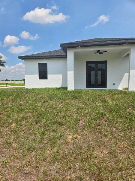 Front exterior of a new home in , Lehigh Acres, FL, highlighting curb appeal (Image 20). Front exterior of a new home in , Lehigh Acres, FL, highlighting curb appeal (Image 20).