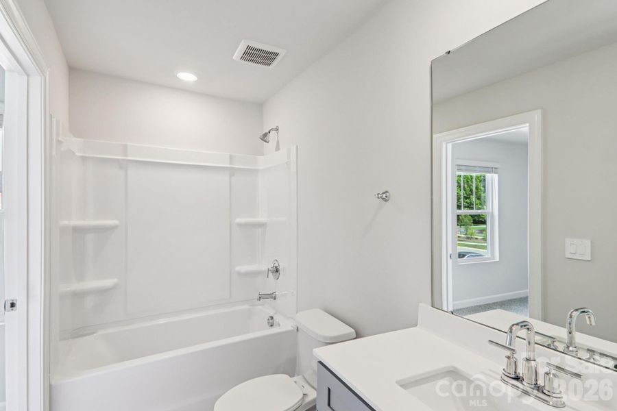 Photo is not of the actual home, but is an inspirational photo of builder’s model home and may depict options, furnishings, and/or decorator features that are not included