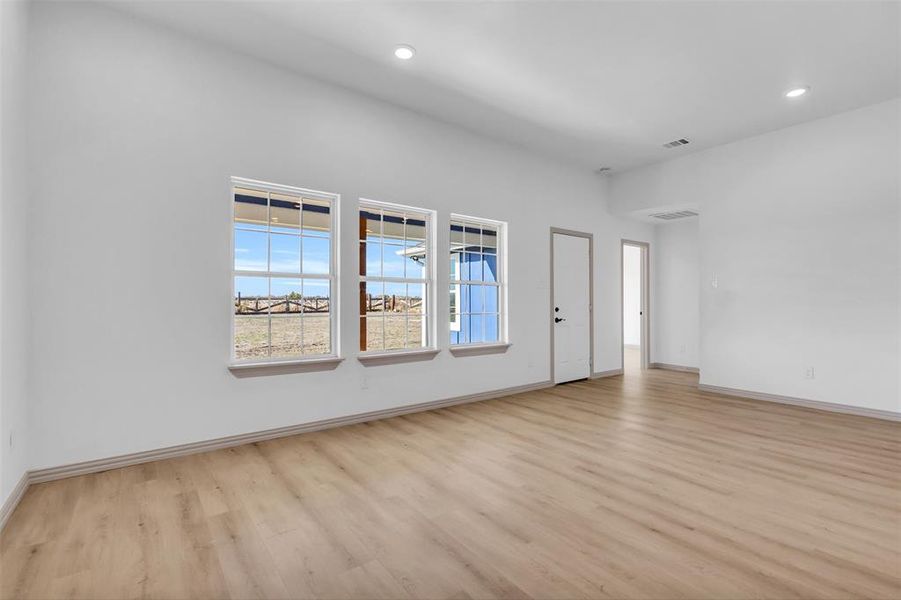 Spare room with light wood-type flooring