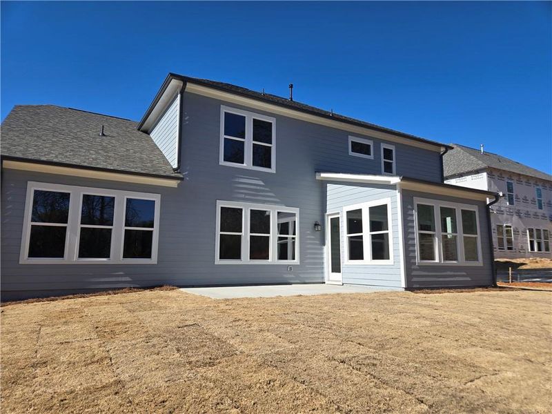 Exterior details and patio area of a home in Ashbury Commons, Powder Springs (Image 24).