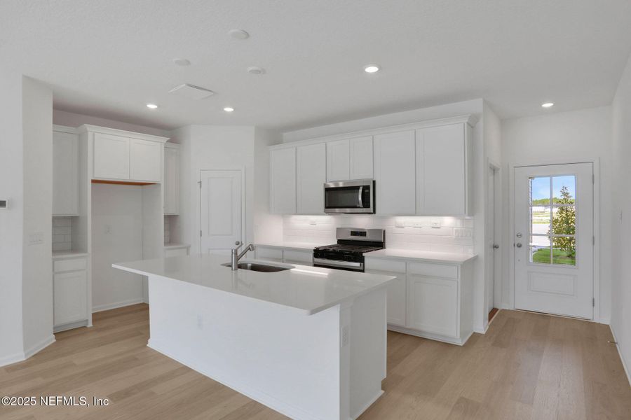 Furnished interior view inside a new home in Brook Forest - Townhomes, St. Augustine (Image 12).