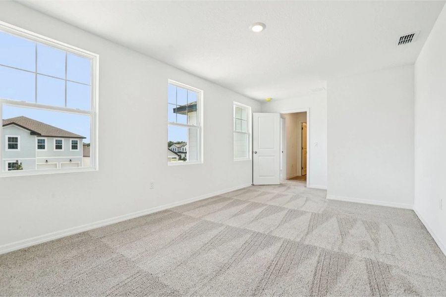 Spacious, unfurnished interior of a new home in Ardisia Park, New Smyrna Beach (Image 21).