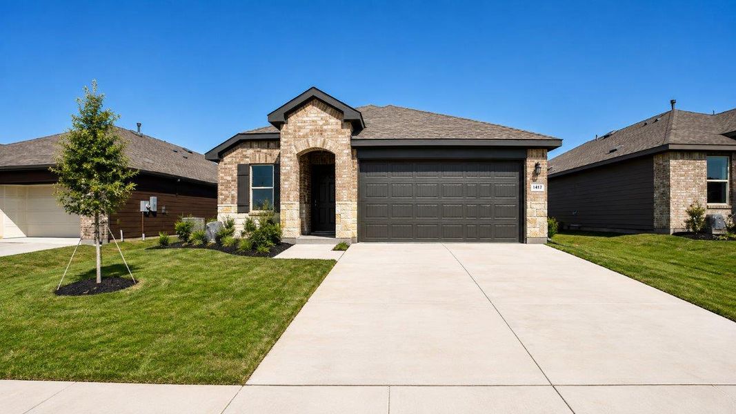 Front exterior of a new home in Hickory Grove, Krum, TX, highlighting curb appeal (Image 1). Front exterior of a new home in Hickory Grove, Krum, TX, highlighting curb appeal (Image 1).