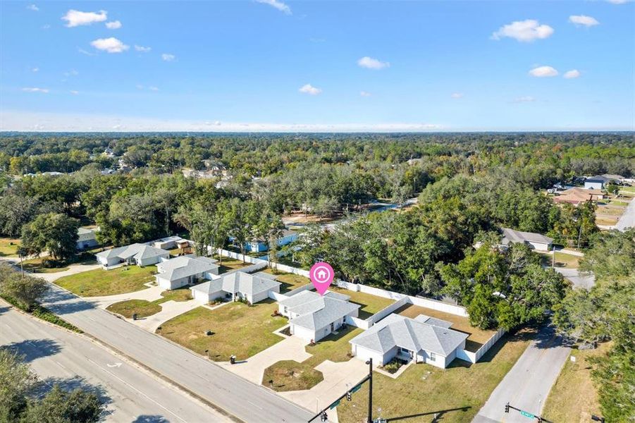 Front exterior of a new home in , Summerfield, FL, highlighting curb appeal (Image 19).