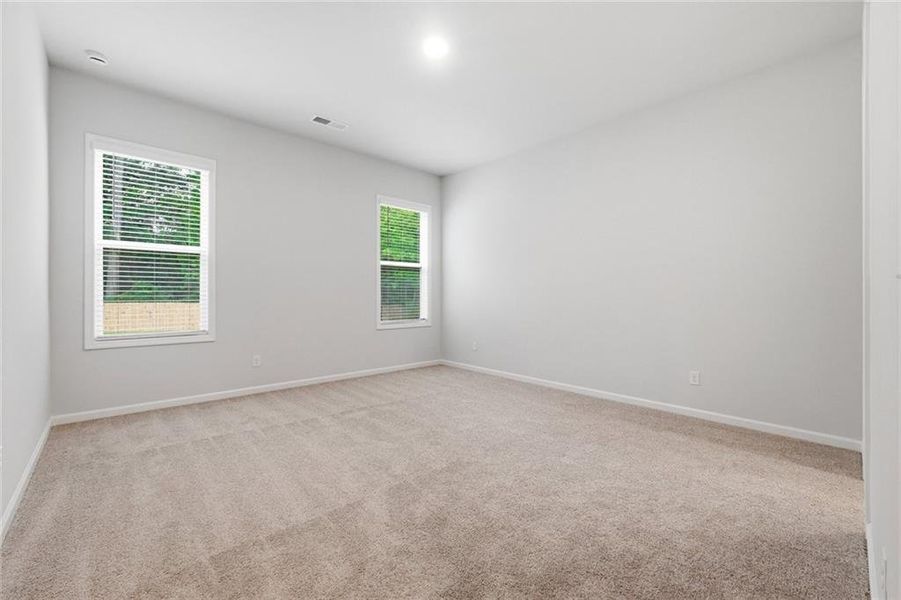 Spacious, unfurnished interior of a new home in The Stables at Ewing Chapel, Dacula (Image 19).