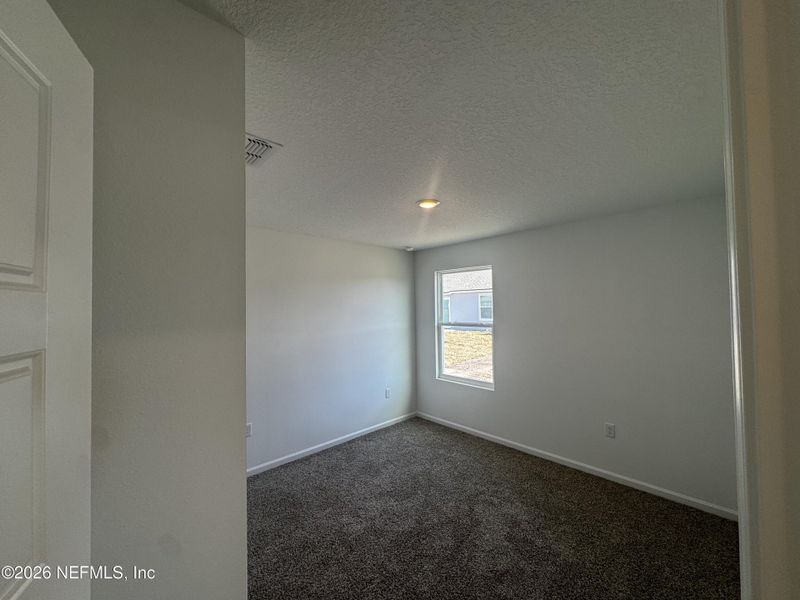 Spacious, unfurnished interior of a new home in The Arbors, Jacksonville (Image 24).