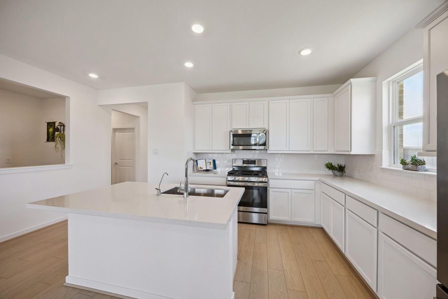View of the island in this amazing kitchen.